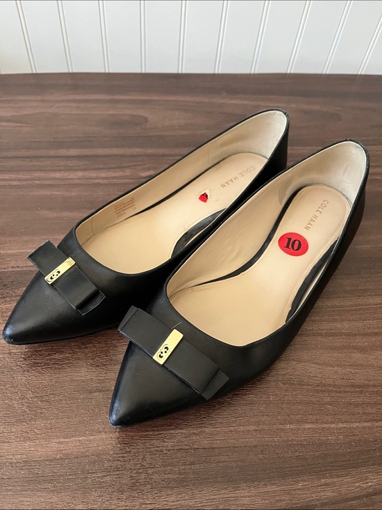 Cole Haan Shoes - Cole Haan Black Pointed Toe Bow Flats with Gold Accent